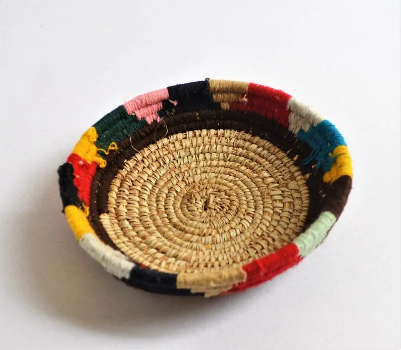 Tribal woven wall plates with wool decoration